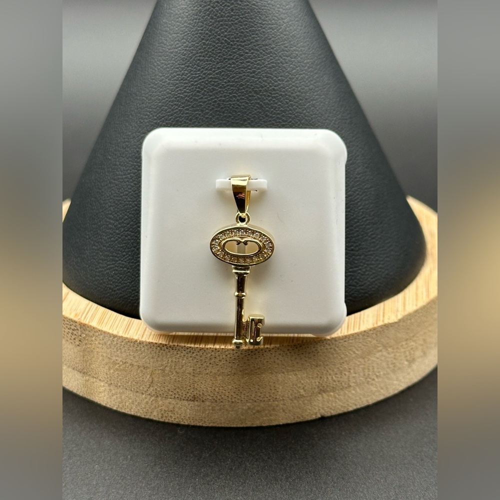Moissanite Key Pendant in 14k Gold over 925 Sterling Silver